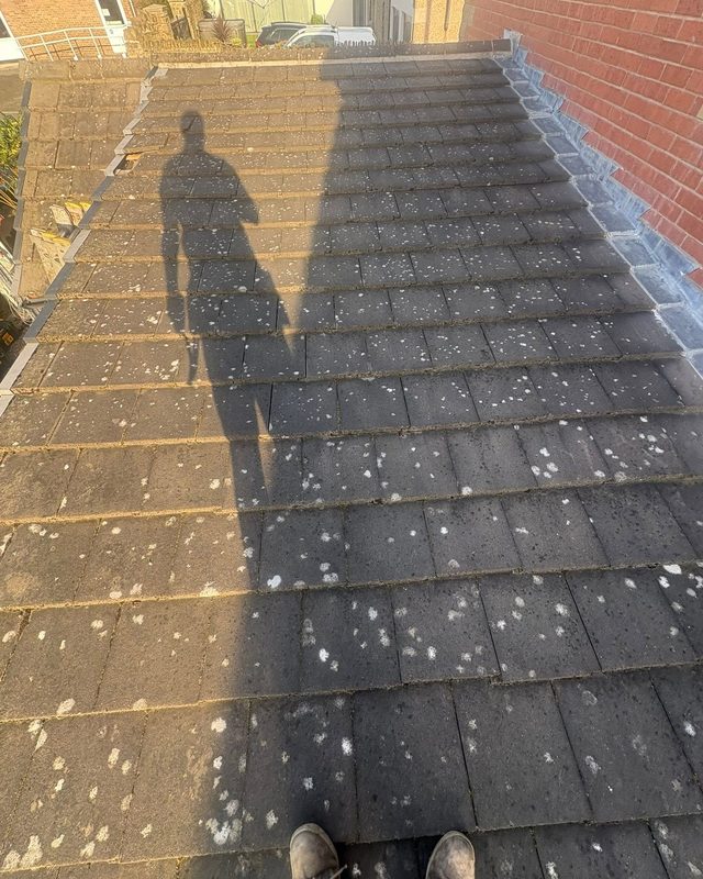 Tired extension roof before AC Roofing in Barnsley