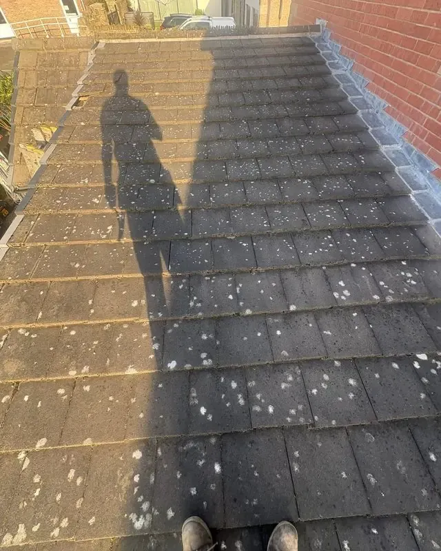 Tired extension roof before AC Roofing in Barnsley