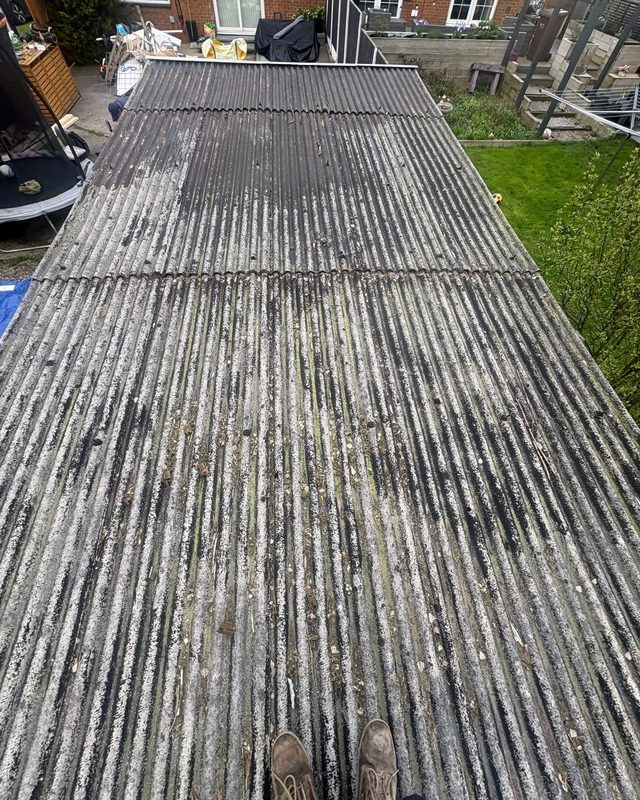 Old asbestos corrugated roof before removal by AC Roofing