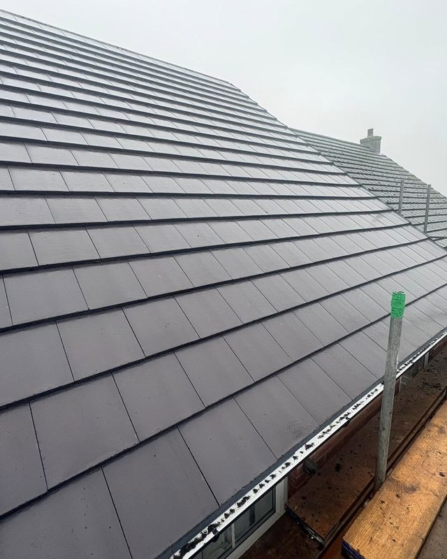 New pitched tiled roof with fascias, soffits and guttering by AC Roofing in Sheffield