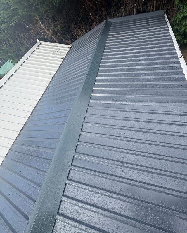 New corrugated sheet garage roof with fascias and guttering by AC Roofing in Wakefield
